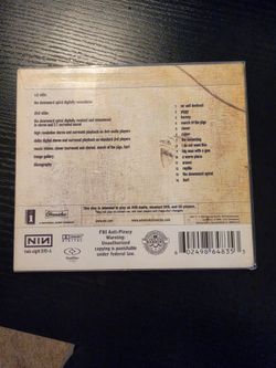 Nine Inch Nails – The Downward Spiral DualDisc, with the CD side + DVD side
Double sided disc.
Used condition.
Selling as is. Obo.