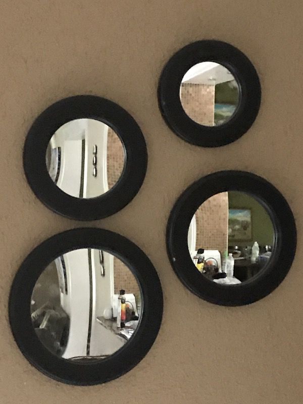 Wall fixture round mirror set.