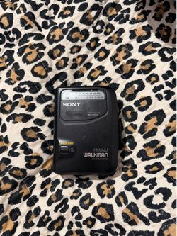 Vintage Sony Walkman WM-FX103 portable cassette player and radio