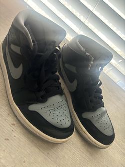 Black and grey Jordan 1s