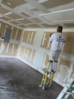 Painter/ Tape And Bed 