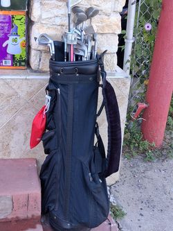 Bolsa y palos de Golf antiguos