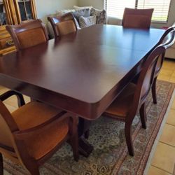 Beautiful dining room table with 6 chairs. Table includes a leaf it extends to fit up to 8 comfortably. 