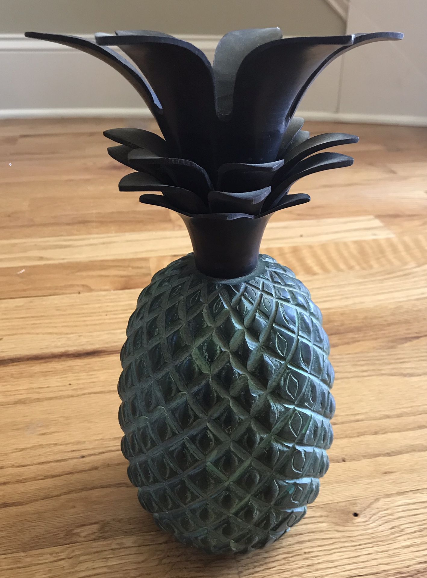 Decorative beautiful antique-looking green tone pineapple