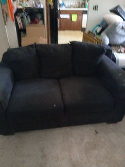 Free small two-person couch black or dark blue