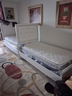 2 twin size beds with mattress and frames included