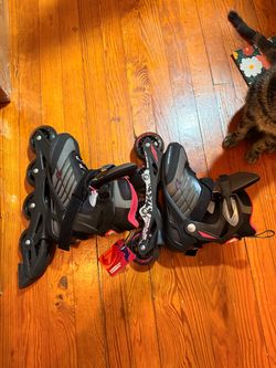 Brand new women’s roller blades and knee pad/wrist guards - size 7 - $75