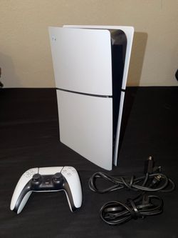 PS5 Slim with controller and cords