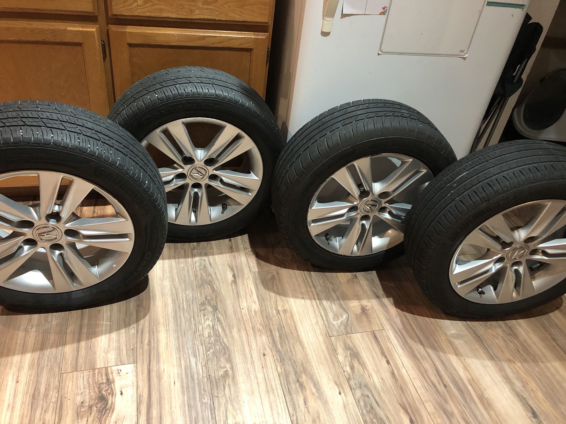 Acura stock tires and and rims