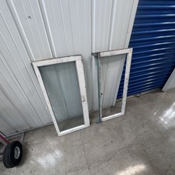 Vintage windows. One of them is just the frame no glass. Let me know if you’re interested in one or both. Thanks!