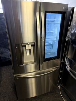LG counter depth stainless steel French door refrigerator and bottom freezer