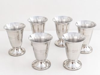 Set of 6 matching silver-tone footed goblets with a classic flared design and etched decorative band.