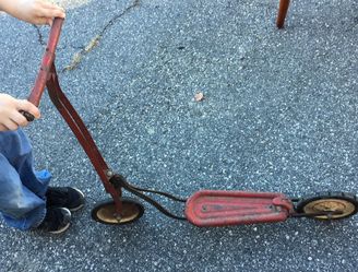 Antique red scooter