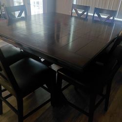 Large table with 8 chairs