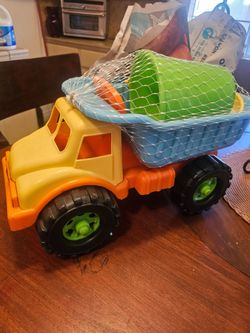 Dump truck with toys  for the beach