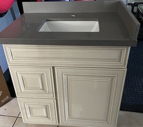 New bathroom vanity with sink and countertop