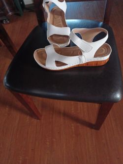 New sandals ordered on line wrong size. $10. See description