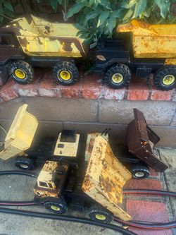 Vintage Tonka Dump Trucks I have about 15 $25 each or bundle price