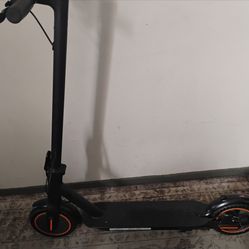 electric scooter (comes fully charged and with  charger)