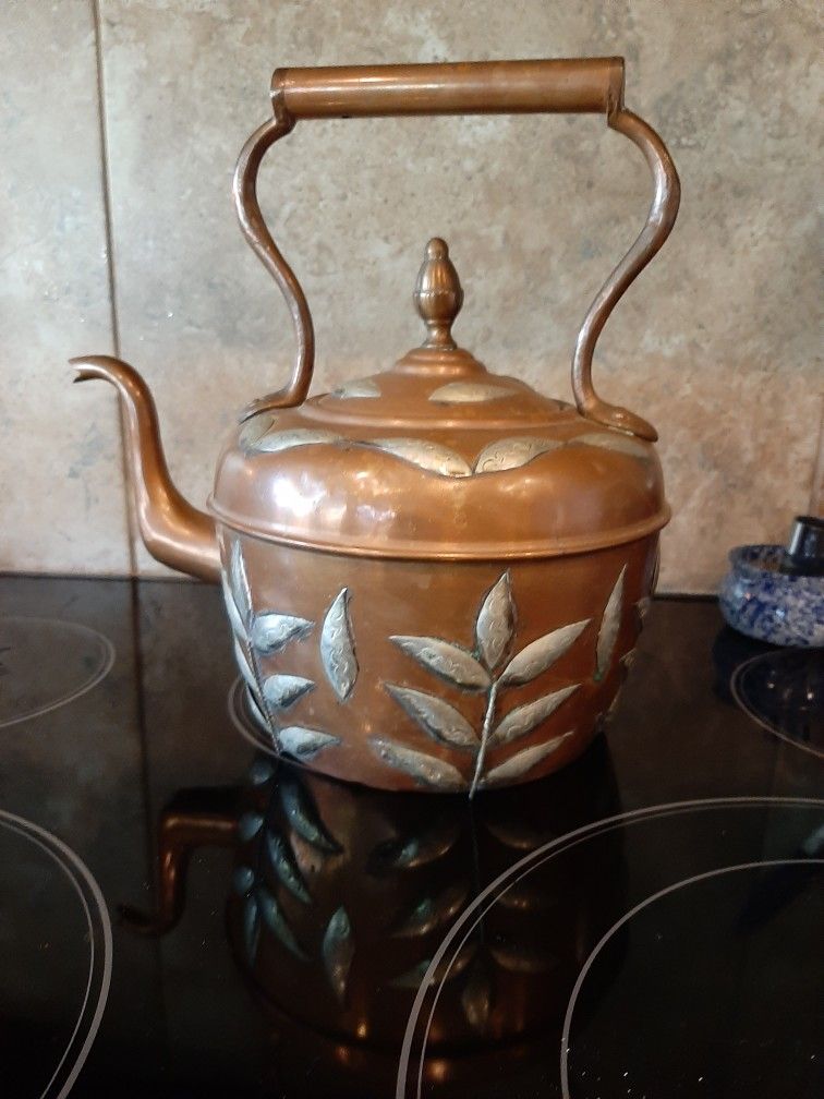 Copper and brass tea kettle