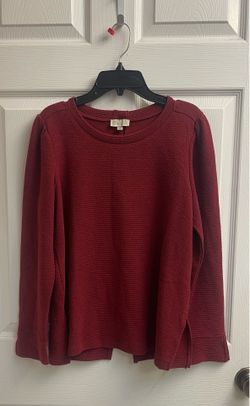 Brand new Ladies ribbed top with buttons on back size M