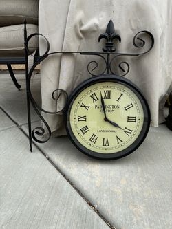 Double sided patio clock