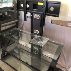 Entertainment center with glass shelves. In perfect condition.