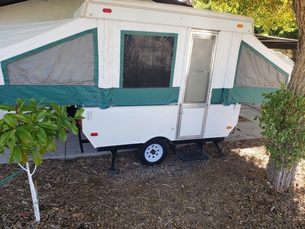 2002 pop up camper /trailer/hybrid/travel rv.