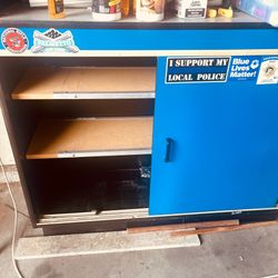 Storage cabinet with sliding doors, garage