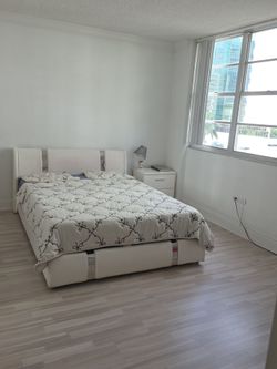 White Upholstered Queen Bed Frame with Storage