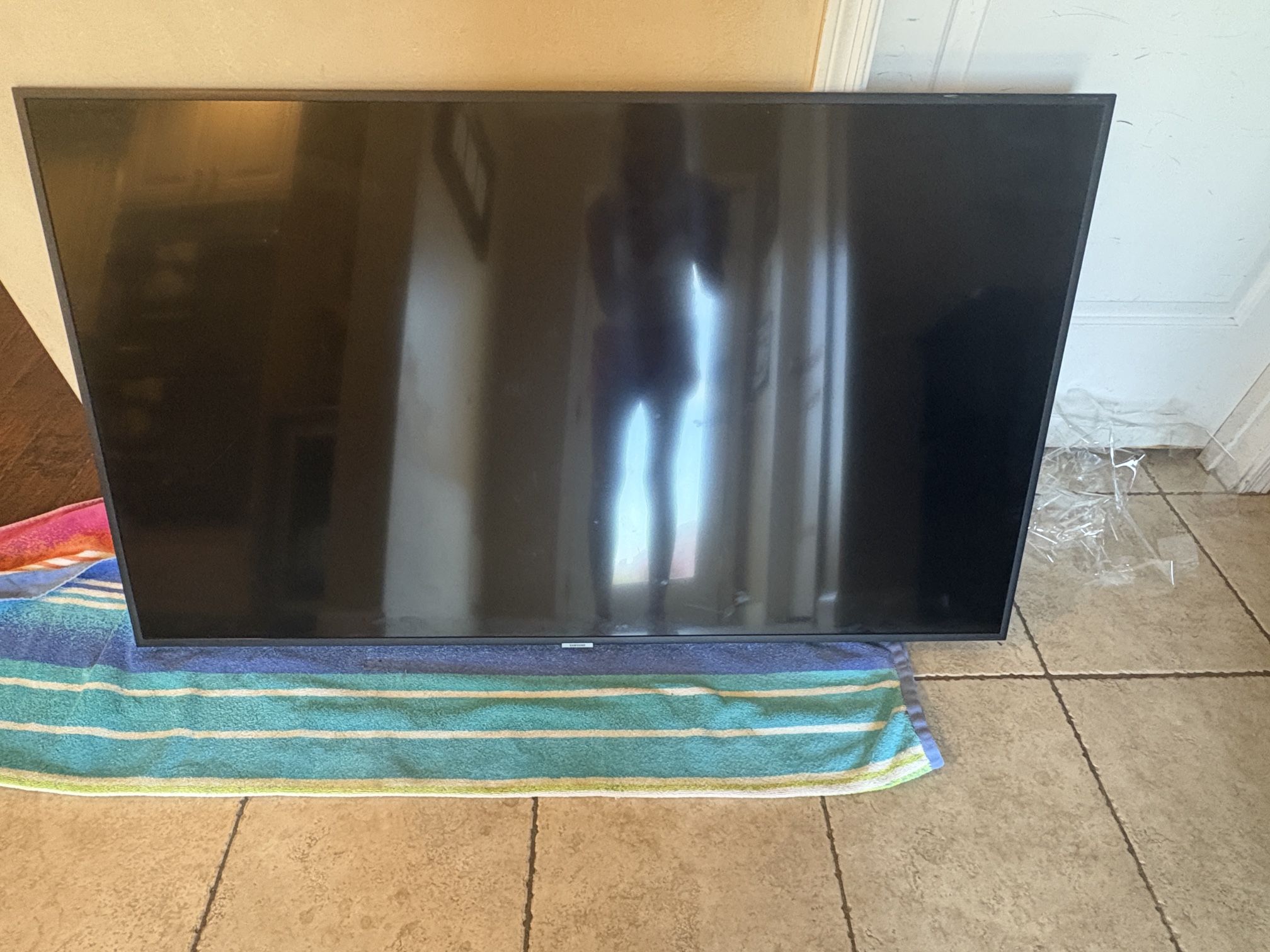 Samsung TV and stand with wheels