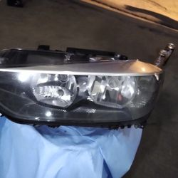 2014 BMW 320 Headlight drivers side OEM