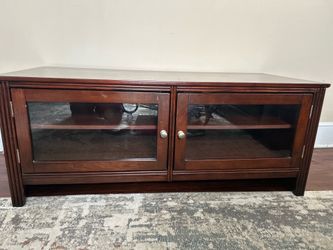 Solid wood TV console with glass doors