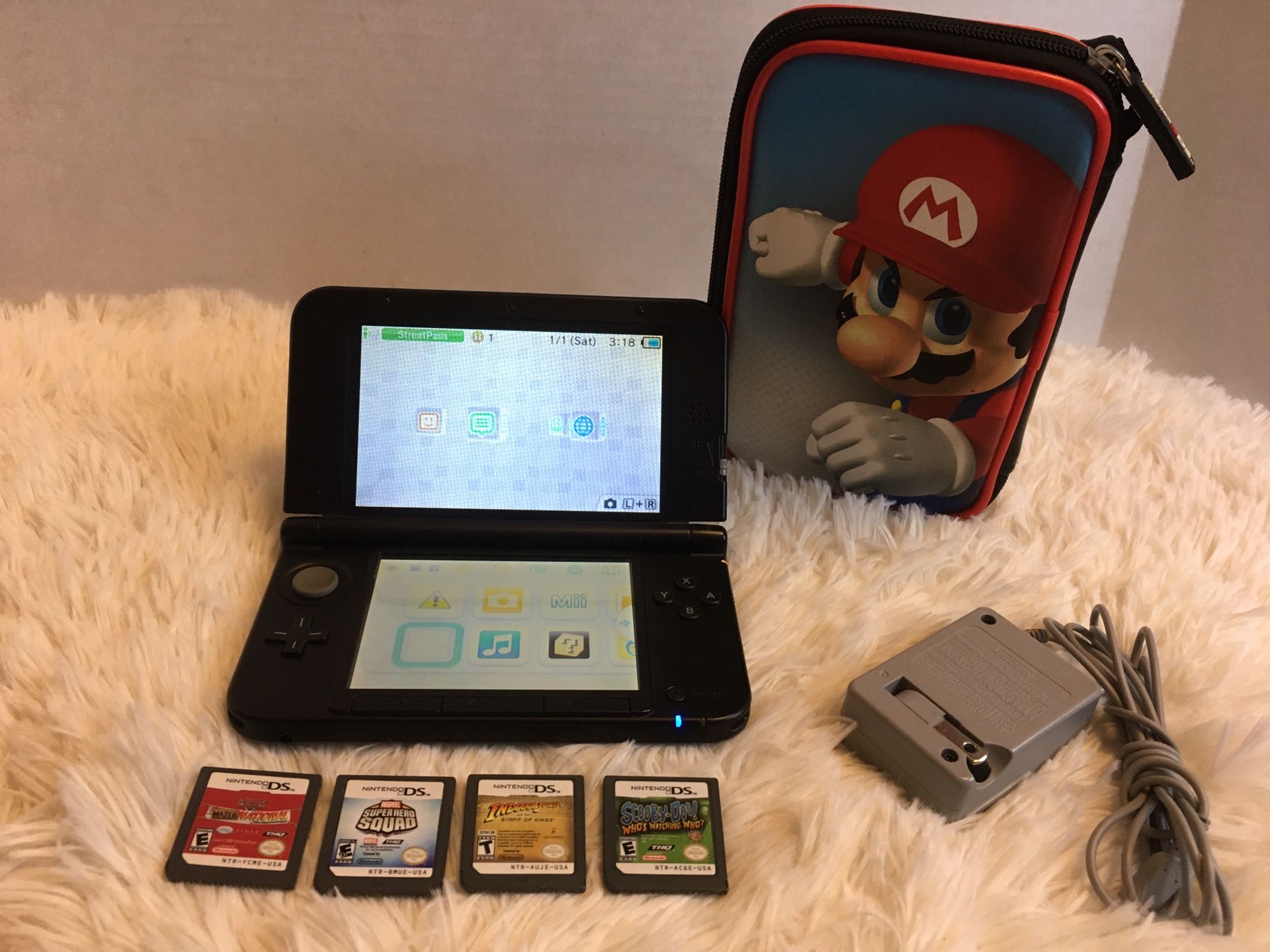 Nintendo 3DS XL Black with games, Mario Case and charger