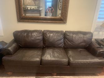 Ashleys Furniture 4 piece brown leather couch set  