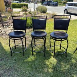 Three Swivel Bar Stools With Back
