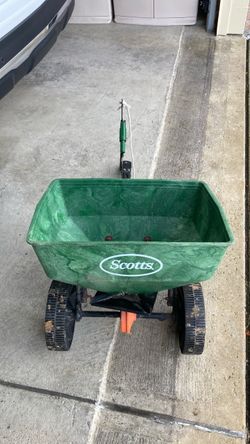 Scott’s pull behind spreader with large hopper Scott’s pull behind spreader with large hopper