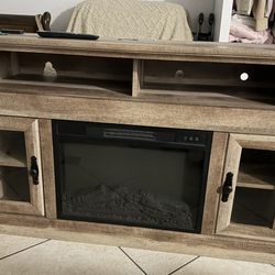 Tv stand with fireplace