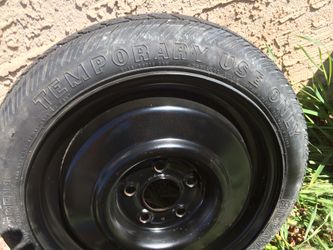 (BRAND NEW CONDITION) SPARE TIRE SIZE T115/70D14 -BRAND NEW ($43) OBO