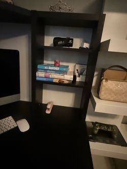 Corner black desk (items on desk not included )