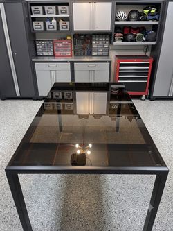 Glass top metal frame 4-seater Dining table