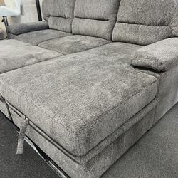 Gray Sectional With Pull Out Bed & Storage Chaise