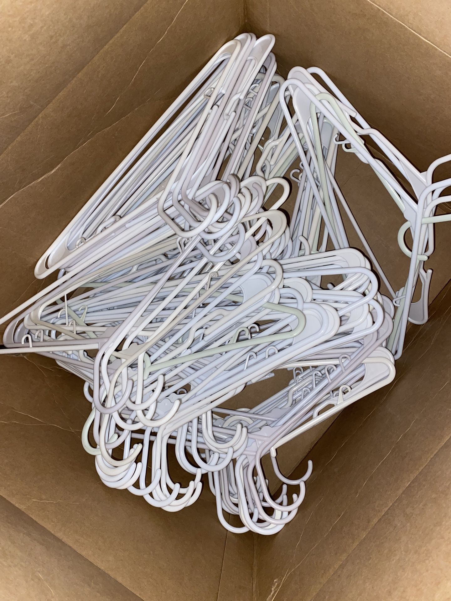100 white hangers