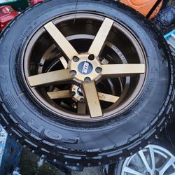 P245 65r 17  Set Of 4.  Mag Gold Rims 