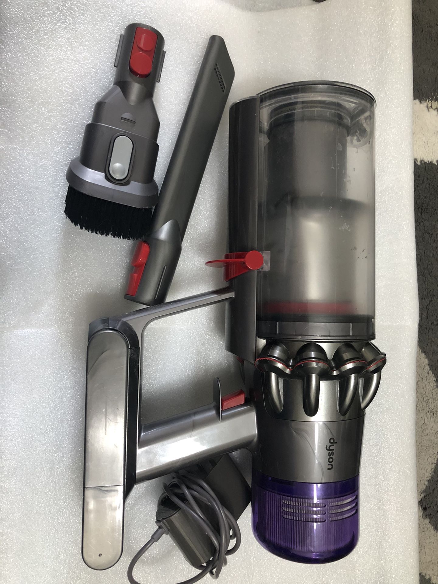 Dyson V11 Torque Drive Cordless Vacuum Cleaner - Handheld And Charger  Item is in good working condition   Previously used , washed and cleaned   This