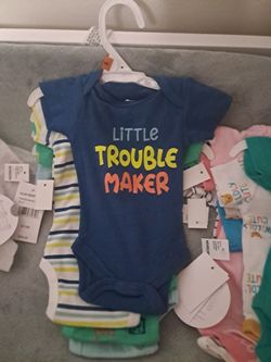 Nb boys onesie with tag on