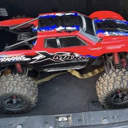 Brand new X max only used it twice in perfect condition comes with dual charger dual force Traxxas Lipo have the original box. Everything 