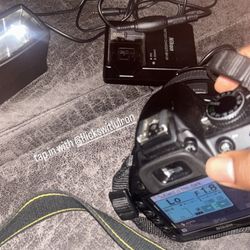 Nikon Camera Doing Trades 