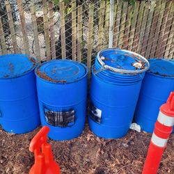 Plastic Storage Drums. 