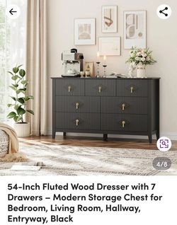 Modern black fluted wood dresser has seven drawers with gold diamond-shaped handles. Never Used.